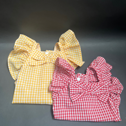 vestido cuadros con olan con botones a presión.